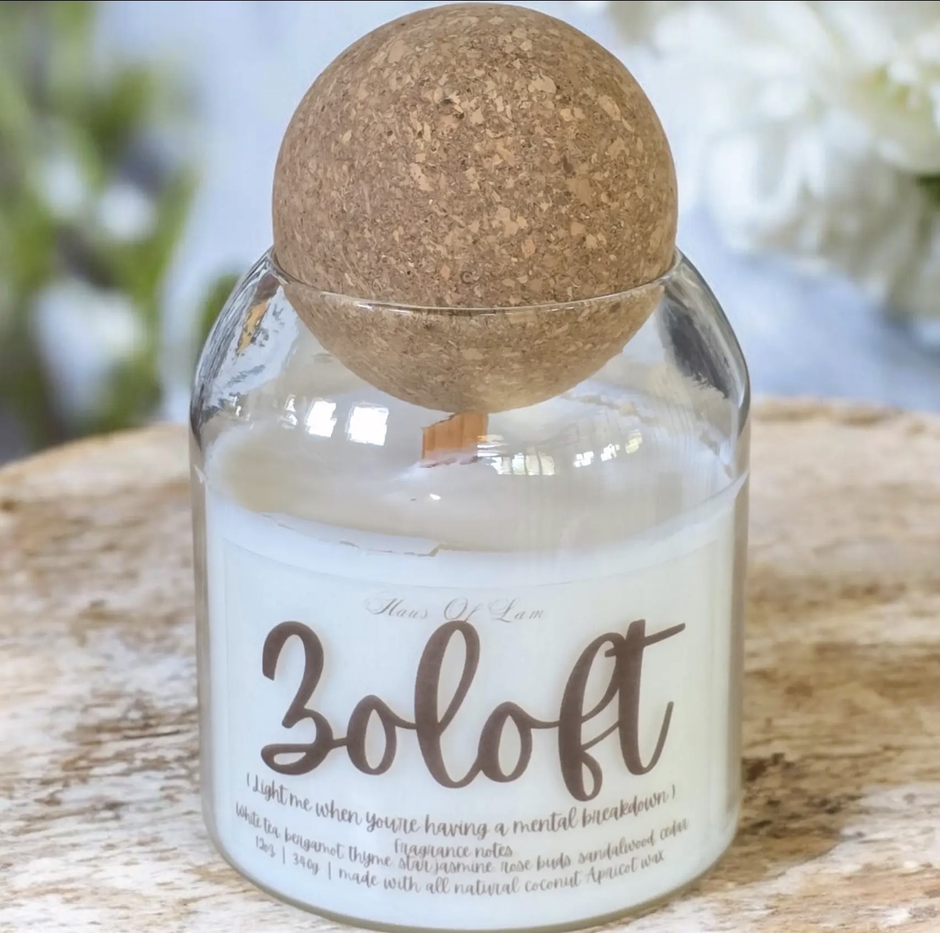 Zoloft candle in a glass jar with a round cork lid
