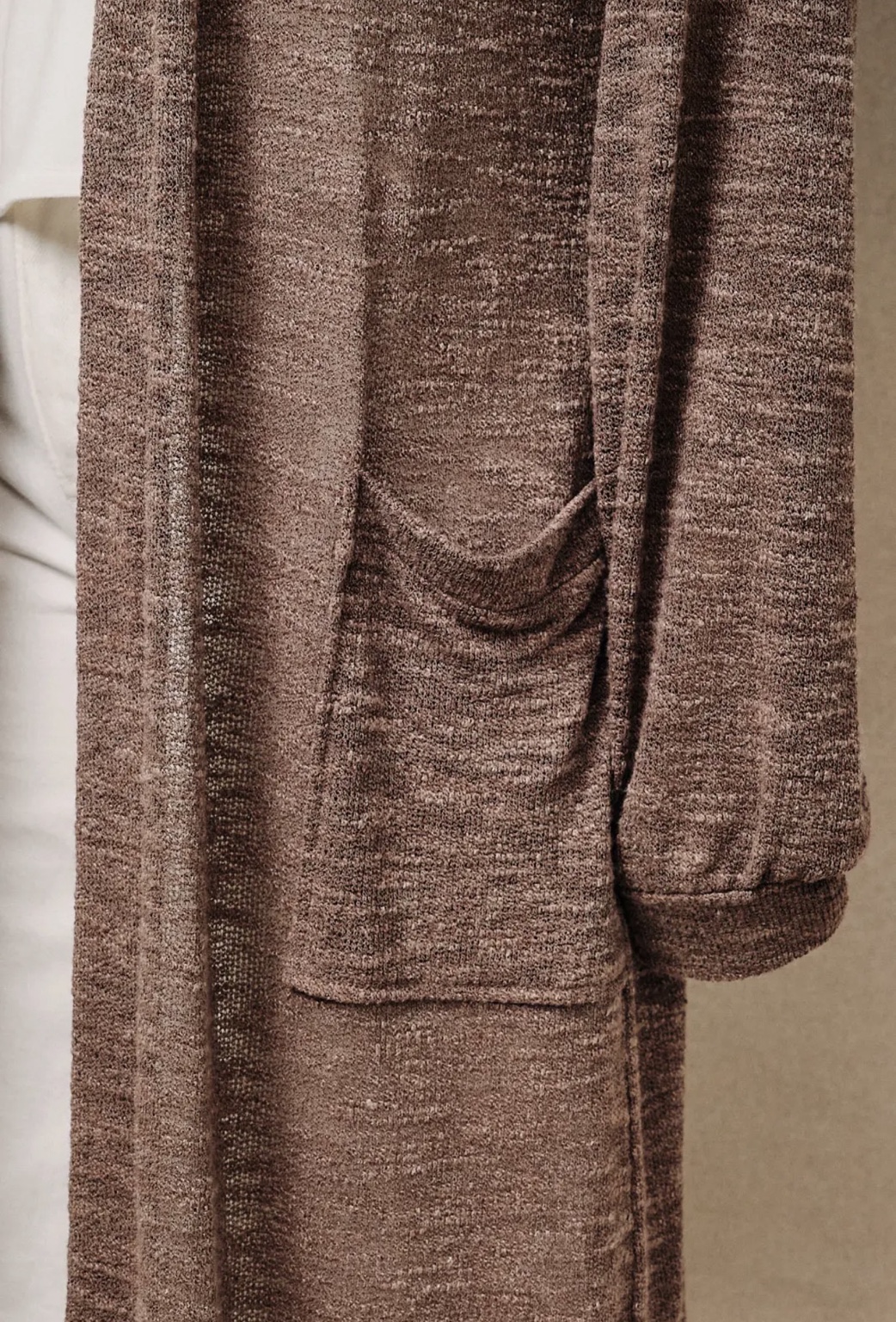 Original close-up of the duster’s marled knit and patch pocket