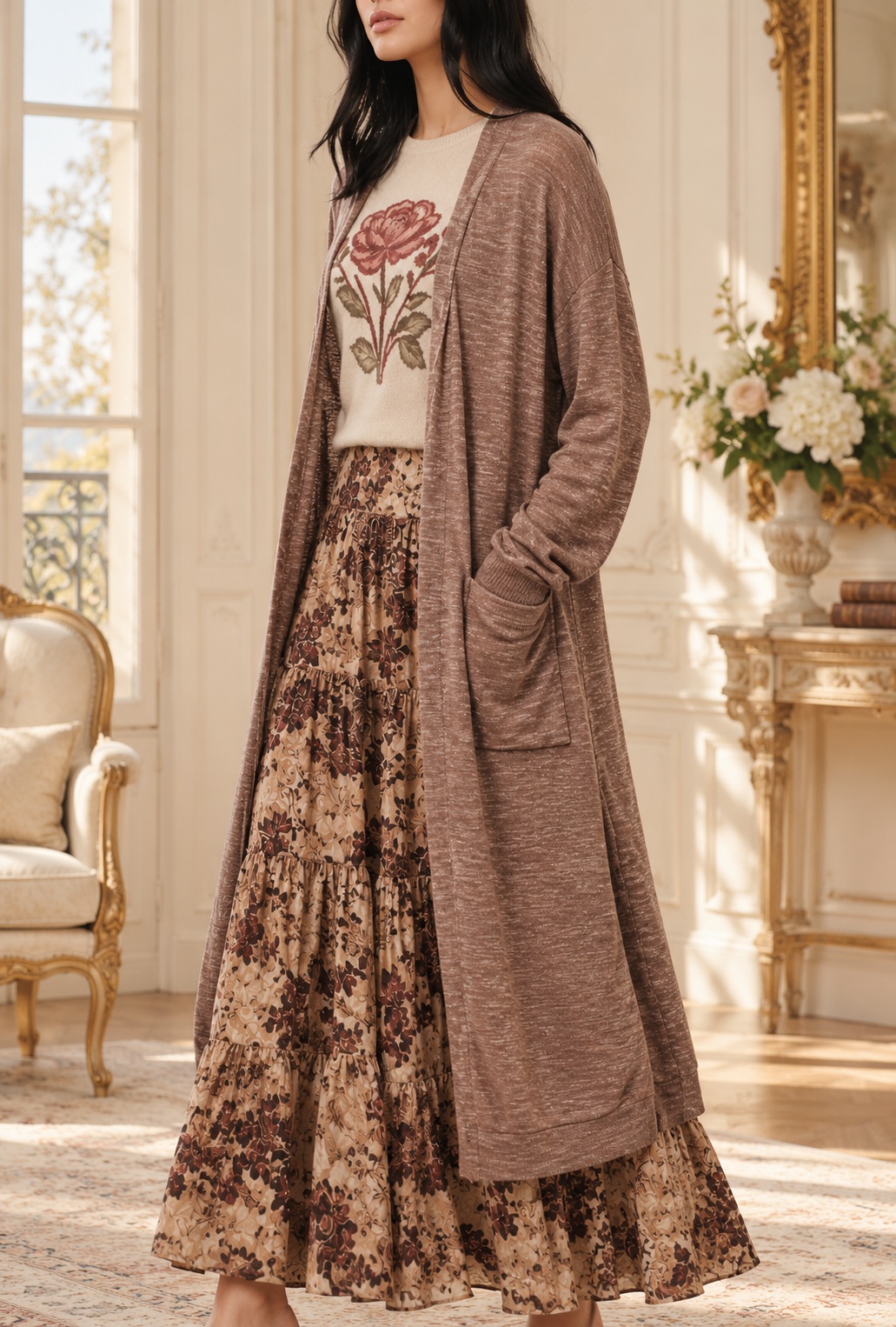 Long mocha knit duster styled with an ivory floral sweater and flowing floral skirt