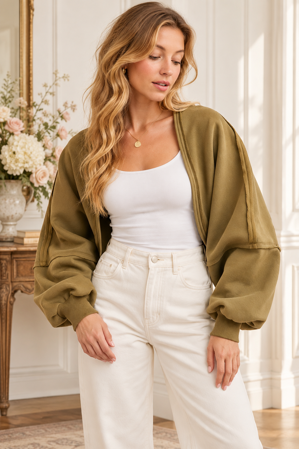 Olive cropped open-front bolero with full sleeves and exposed seam details